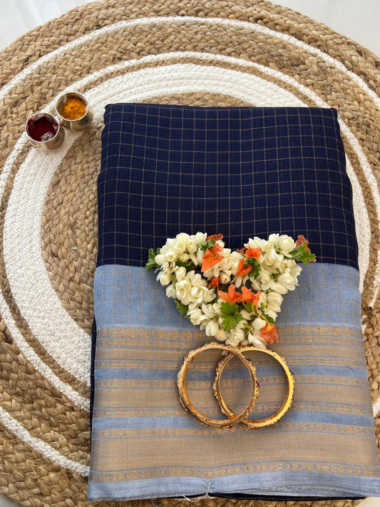 Navy blue check saree with powder blue zari border - styled with flowers and bangles