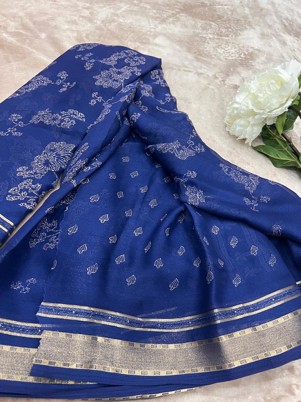 Gold-silver zari border with sequin detail close-up