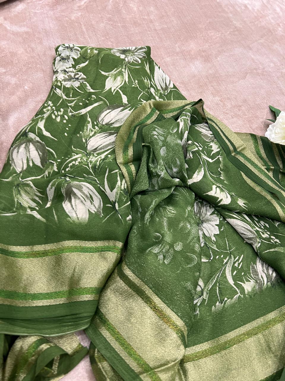 Rasmalai forest green saree draped showing white botanical floral print and gold tissue border