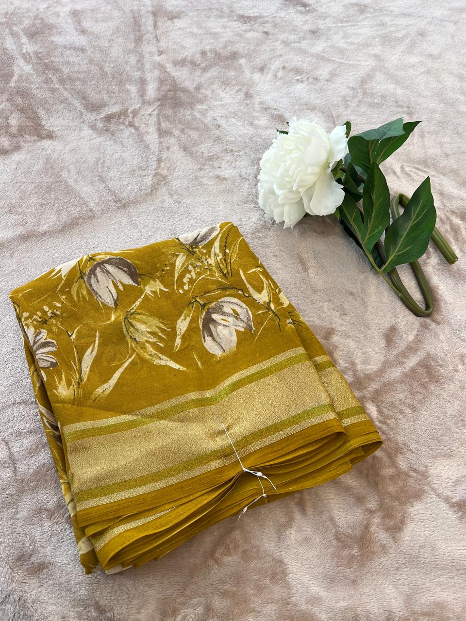 Rasmalai olive gold saree neatly folded showing gold tissue border detail